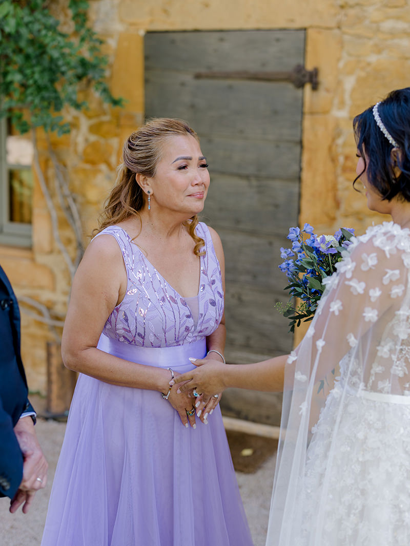 0025-chateau-de-bagnols-wedding-france-bride-family-emotional-moment