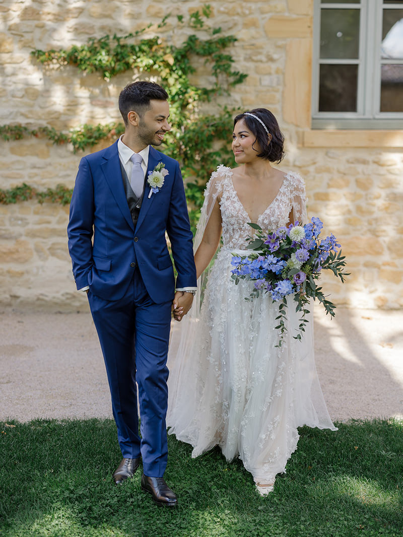 0041-chateau-de-bagnols-wedding-france-bride-groom-courtyard-portrait