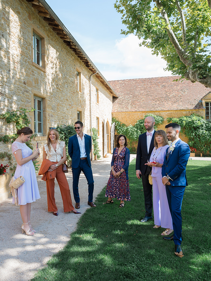 0042-chateau-de-bagnols-wedding-france-wedding-party-chateau-courtyard