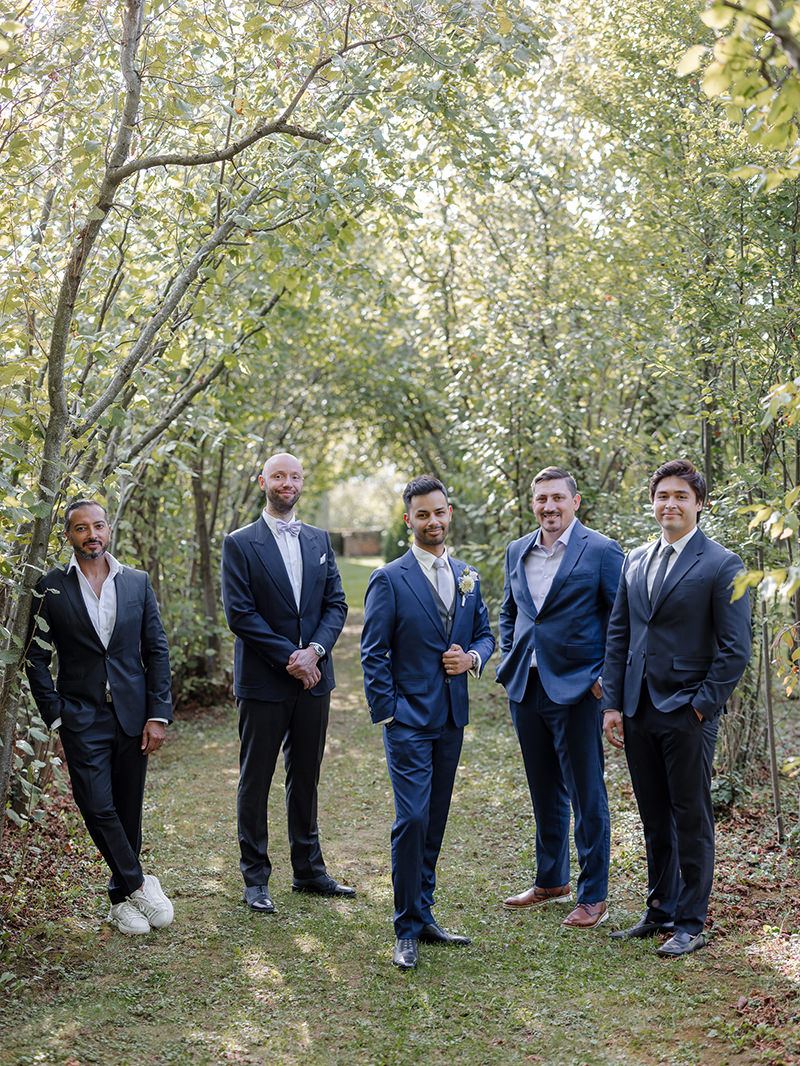 0087-chateau-de-bagnols-wedding-france-groomsmen-portrait-france