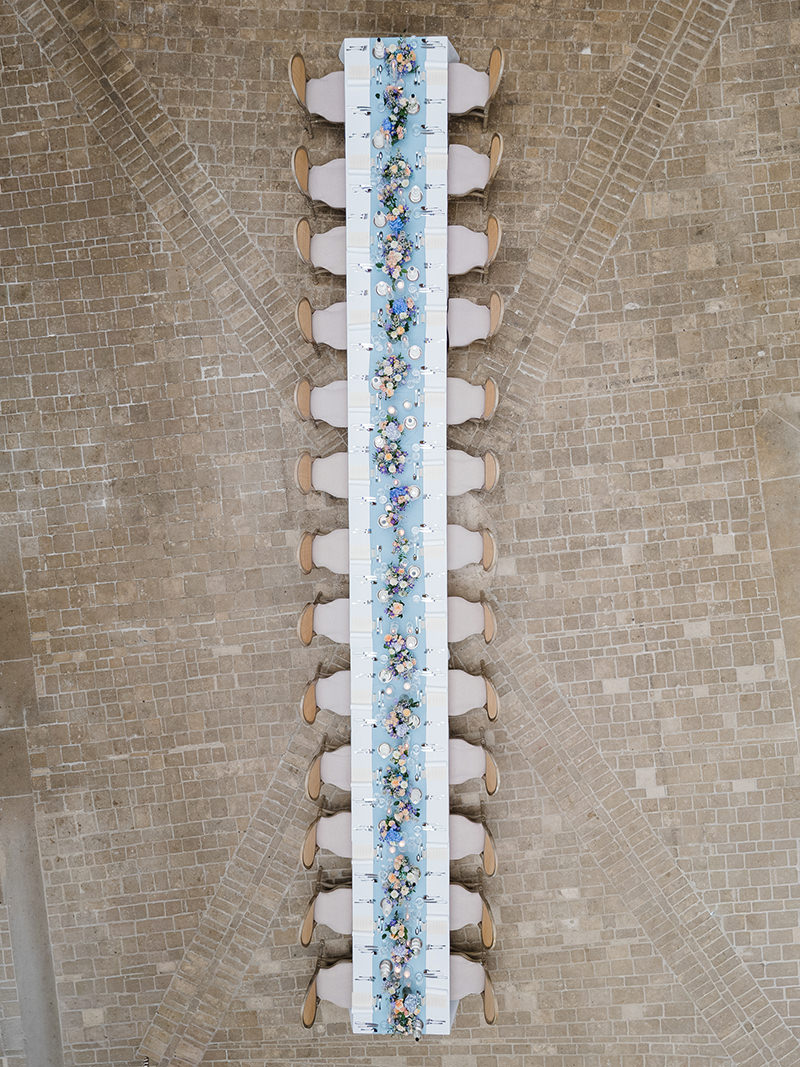 0097-chateau-de-bagnols-wedding-france-long-wedding-table-overhead